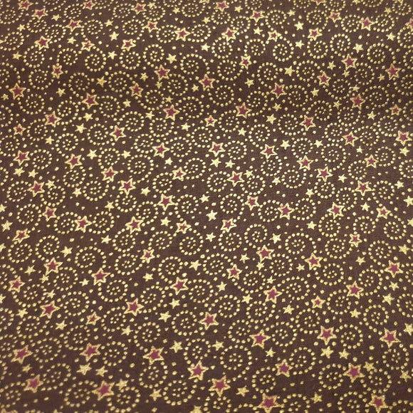 Reststück: Baumwollstoff Weihnachtshimmel / weihnachtliche Sterne, braun; ca. 0,5m