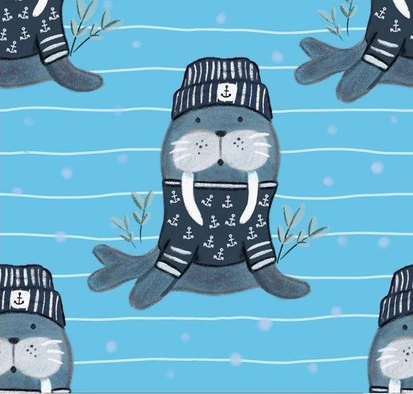 Baumwolljersey Druck Walross mit maritimer Mütze auf blauem Hintergrund mit dezenten weißen Streifen | Fräulein von Julie