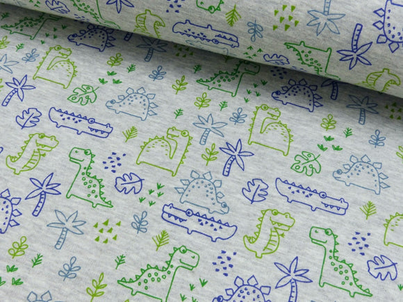 weicher & warmer Alpenfleece Druck mit grünen und blauen Dinosauriern auf hellgrauen Hintergrund