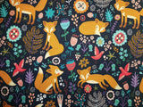 French Terry Stoff Druck orangener Fuchs mit Blüten mit Vögeln, Blüten und Farnen auf marineblauem Hintergrund