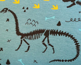 Baumwolljersey Stoff Druck schwarze Dinosaurier Skelette auf hellblau