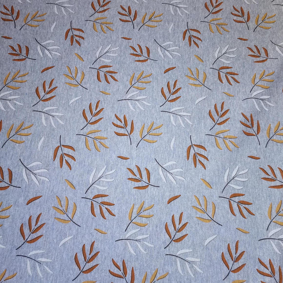 Reststück: weicher & warmer Alpenfleece Druck mit braunen und goldenen Blättern auf hellblauem Hintergrund; ca. 0,7m