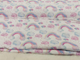 Baumwoll Musselin Stoff "Regenbogen" weiß mit pastellfarbenen Regenbögen und Wolken | Fräulein von Julie